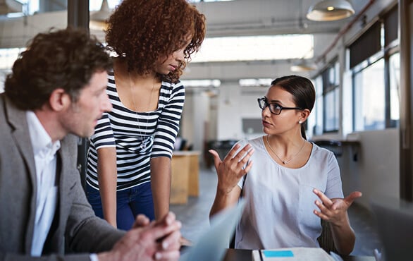 Team of professionals learning tools for managing chaos and setting priorities under pressure.